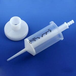 A clear plastic syringe with a white plunger and cap on a blue background.