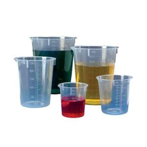 A set of clear plastic measuring cups with different colored liquids.