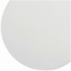 Minimalist white circular surface against a plain background.